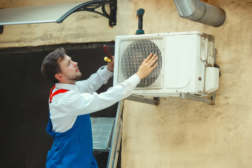 hvac-technician-workin ON AC