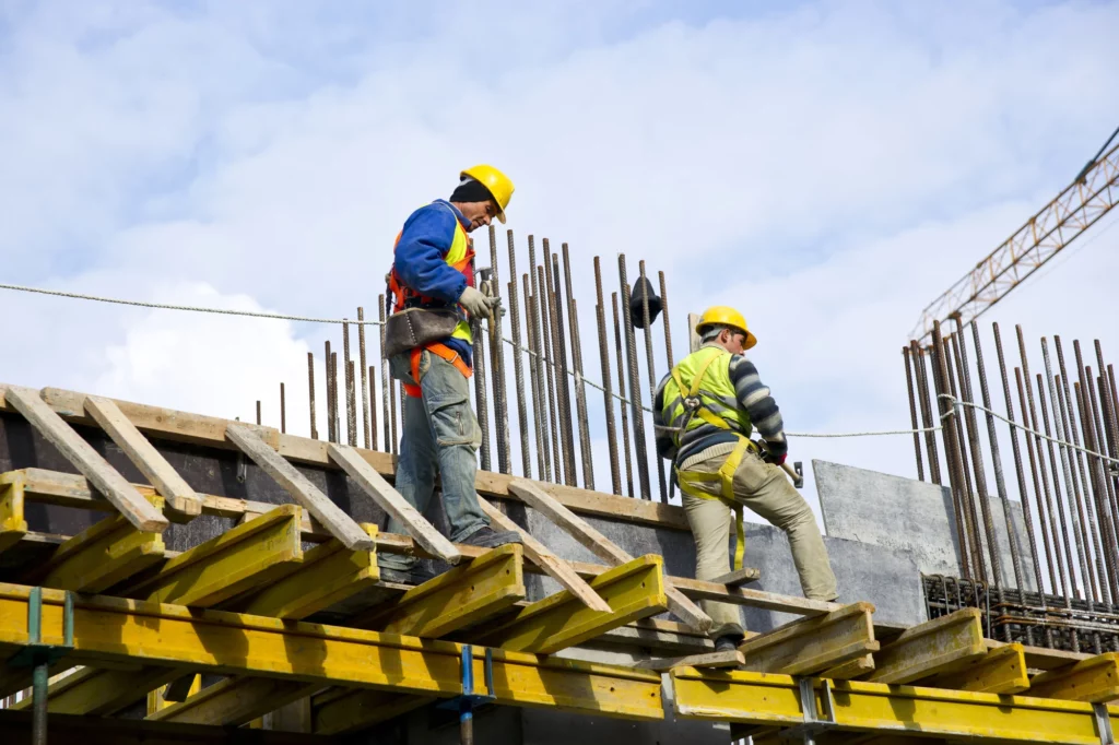 workers examining work